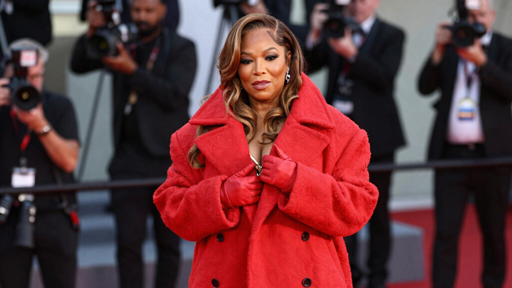 Queen Latifah Bundles Up in a Bold, Oversized Coat on the 2026 BET Awards Red Carpet